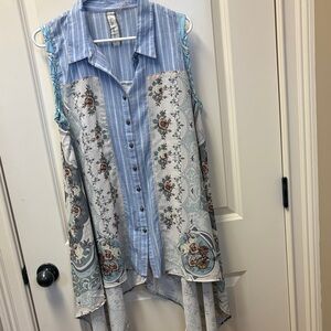 Button up blouse with slit in back